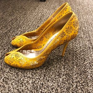 Yellow BCBGIRLS heels lightly worn